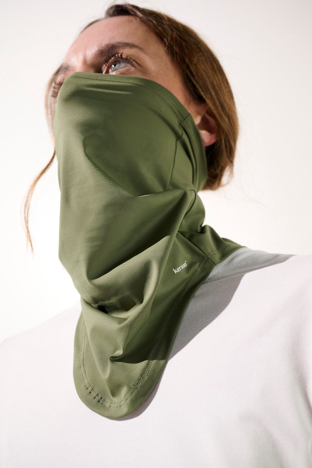 Tour de cou anti-UV - Boston en vert, léger et extensible pour une protection solaire quotidienne.