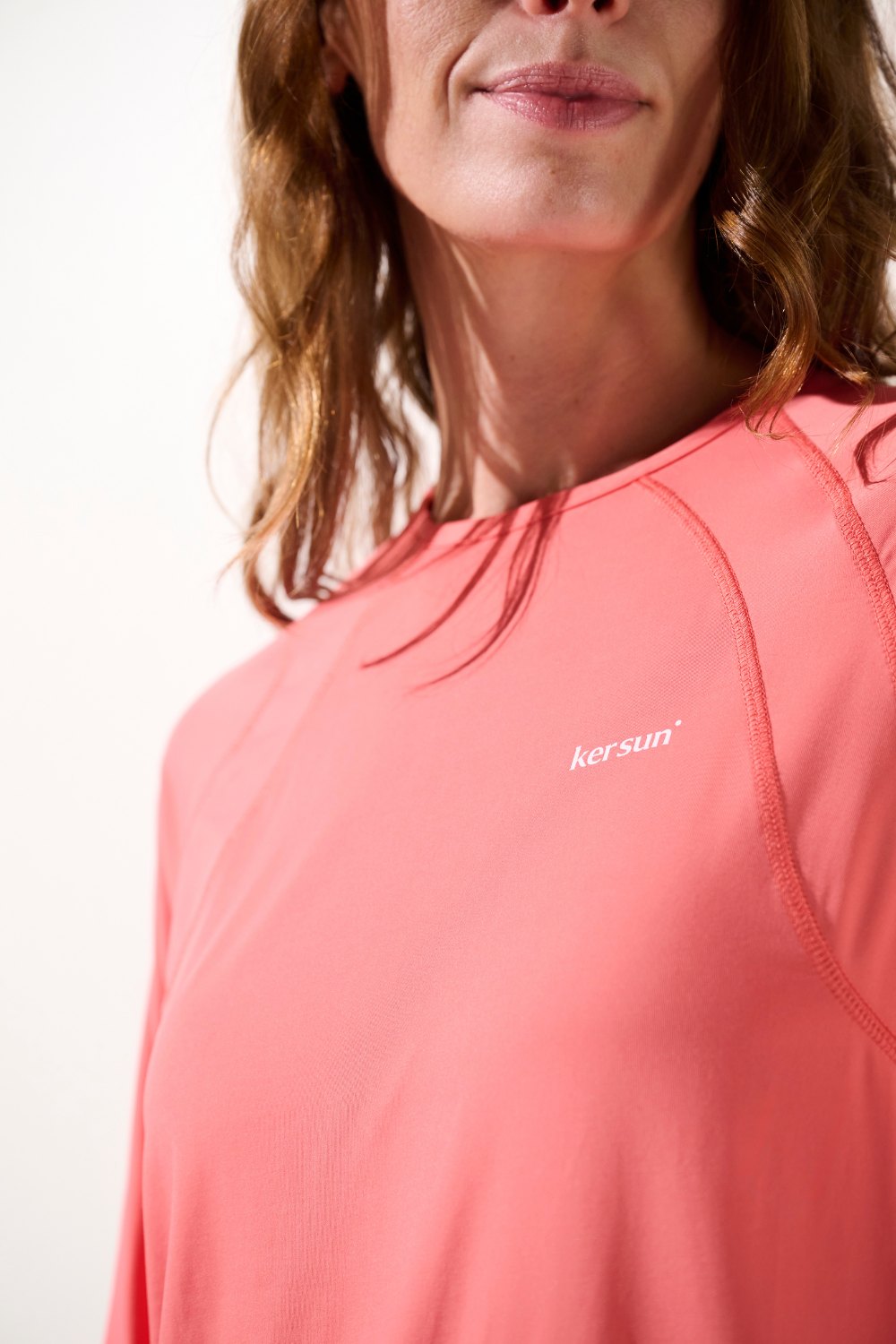 T-shirt anti-UV - Oasis femme, manches longues légères UPF 50+ en corail pour activités en plein air.