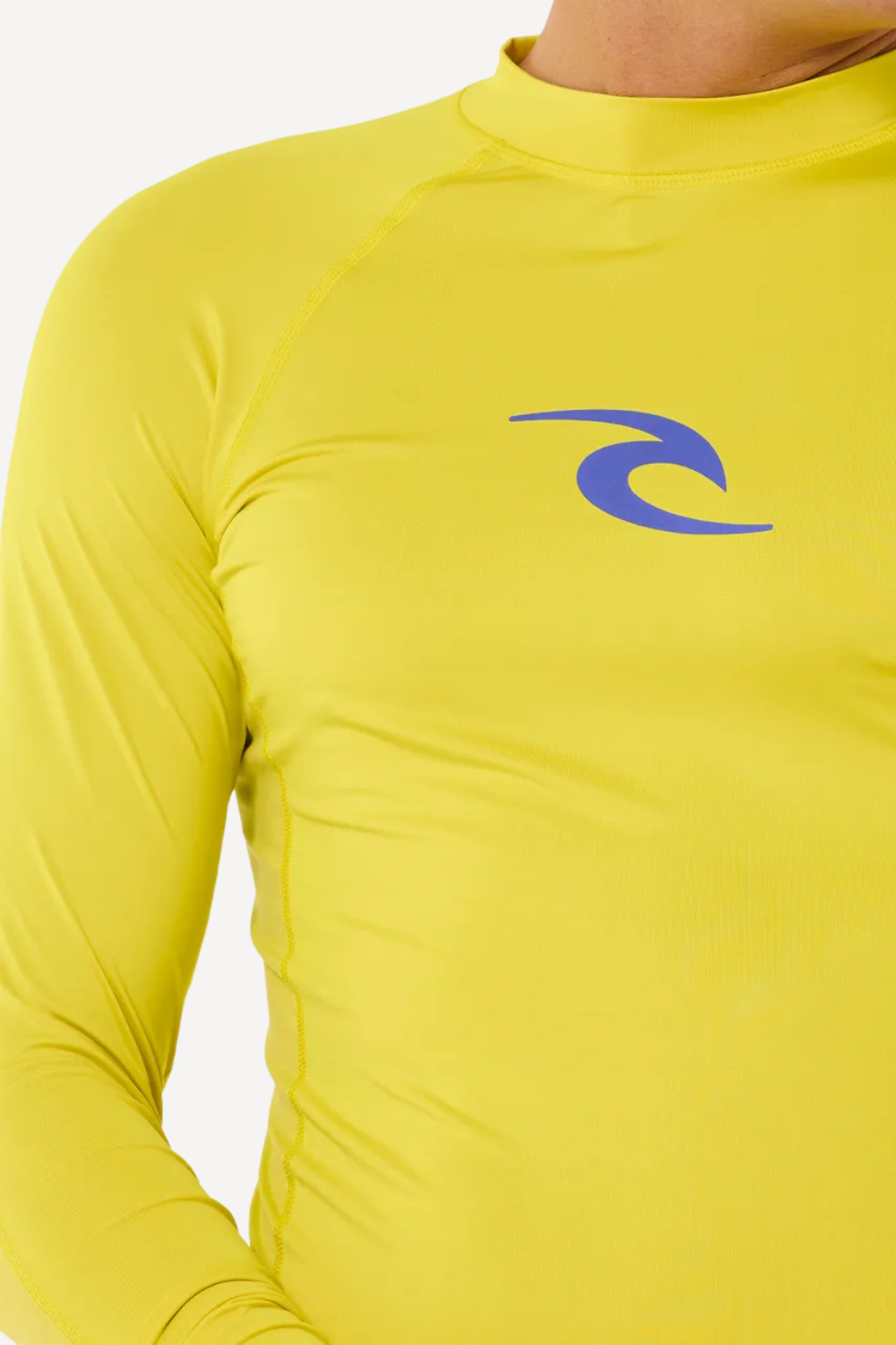 T-shirt de bain anti-UV jaune à manches longues Rip Curl, UPF 50+, idéal pour les sports aquatiques en plein soleil.