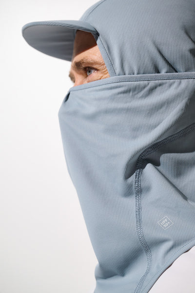 Cagoule visière anti-UV - Ventoux en bleu, légère et respirante, idéale pour protéger le visage contre le soleil.