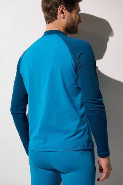 Veste de bain anti-UV - Moorea, homme en lycra bleu respirant, protection solaire UPF 50+ pour activités aquatiques.