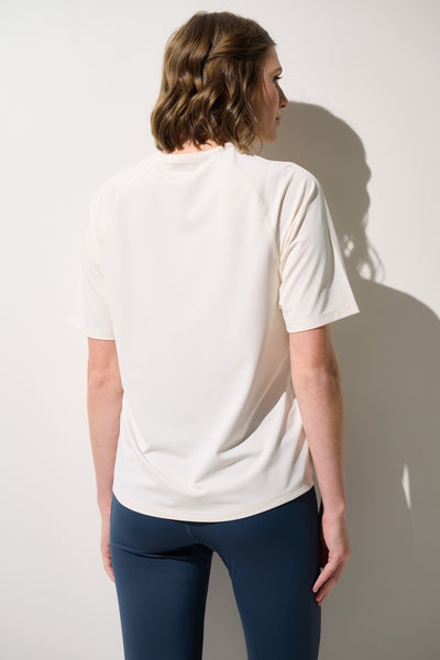 T-shirt anti-UV Boston blanc pour femme, léger et respirant, idéal pour le sport avec protection UPF 50+.