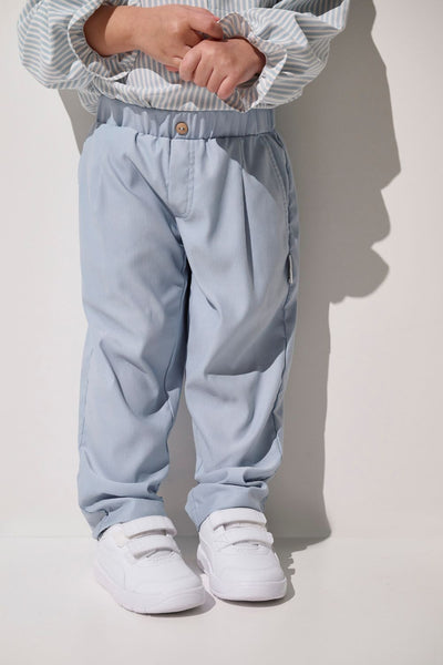 Pantalon anti-UV - Faro, bleu clair pour enfant, léger et confortable, idéal pour jouer au soleil.