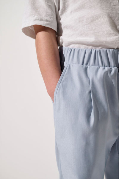 Pantalon anti-UV - Faro bleu pour enfant, léger et confortable, offrant protection solaire UPF 50+.
