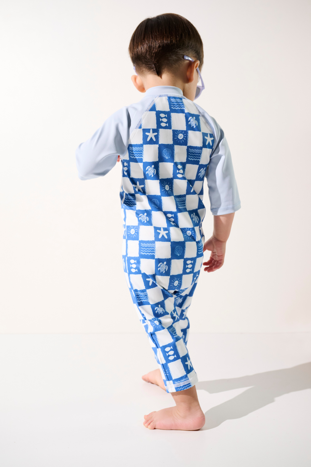 Combinaison de bain anti-UV - Pacific, bleue et blanche, pour enfant, manches longues, protection solaire UPF 50+.
