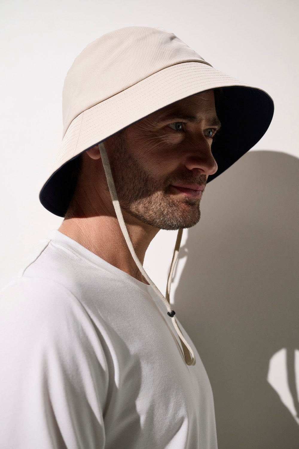 Bob anti-UV - Faro beige pour homme, léger et pratique, offrant une protection solaire UPF 50+.