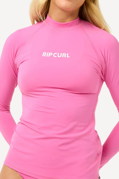 T-shirt de bain anti-UV rose pour femme, manches longues, UPF 50+ de Rip Curl, parfait pour la plage.